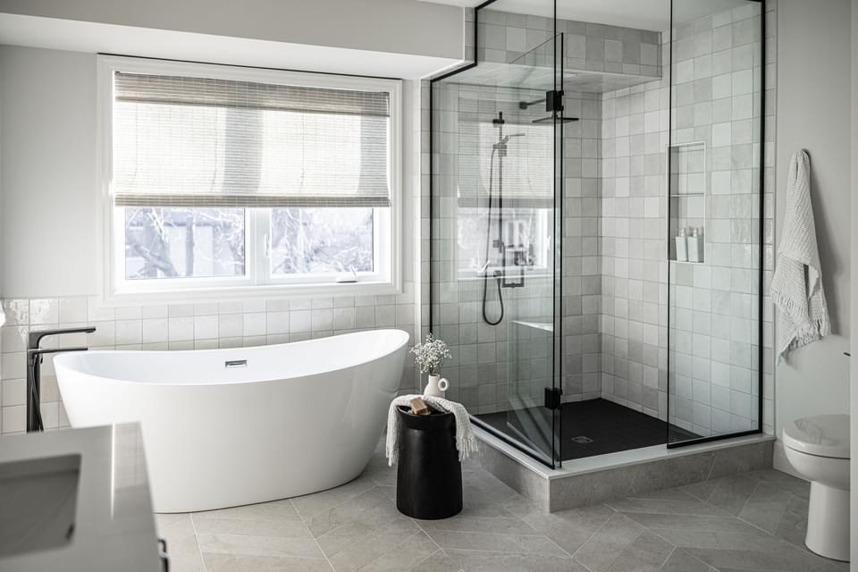 Master bathroom tile installation — freestanding tub and custom shower by Merosmith