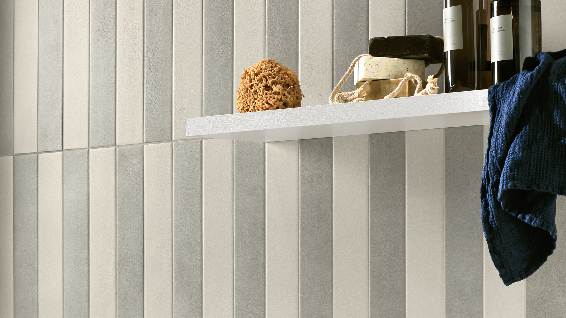 Vertical stripe wall tile with niche shelf