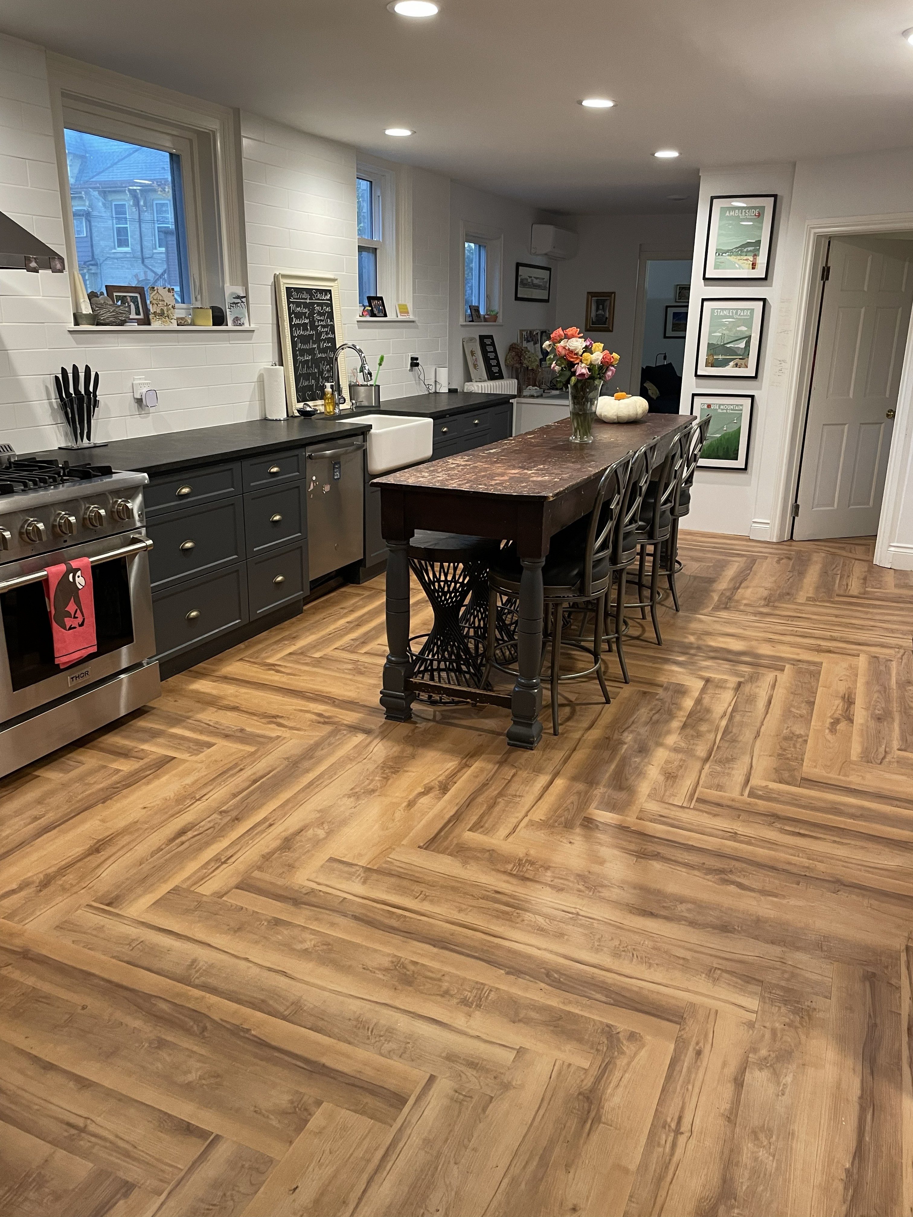 Herringbone luxury vinyl plank kitchen floor